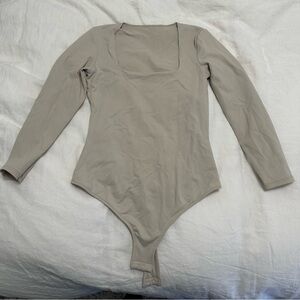 Urban Outfitters women’s beige bodysuit